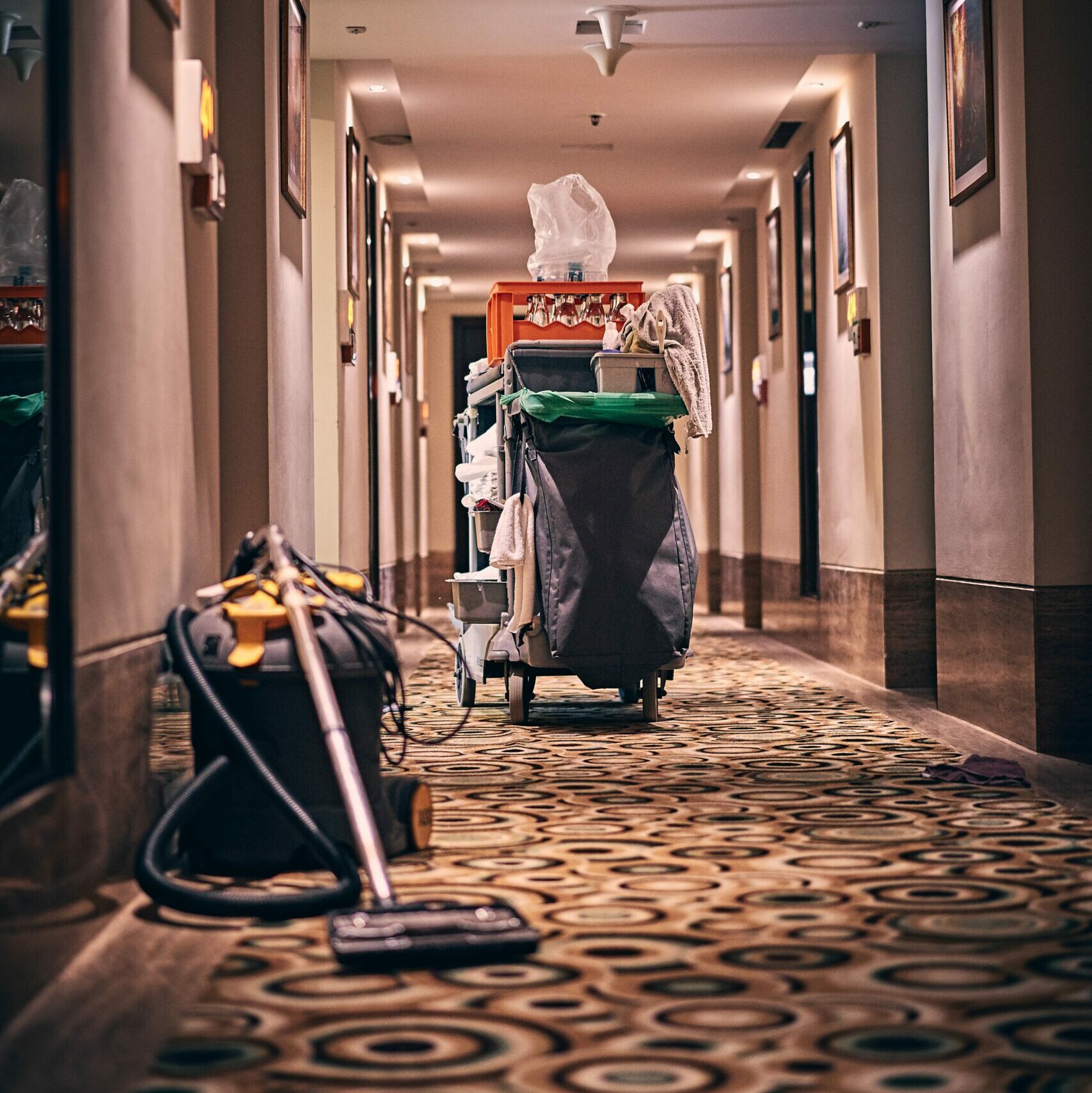 Cleaning a commercial space's hallway with Ontario Cleaning Supply and Services.